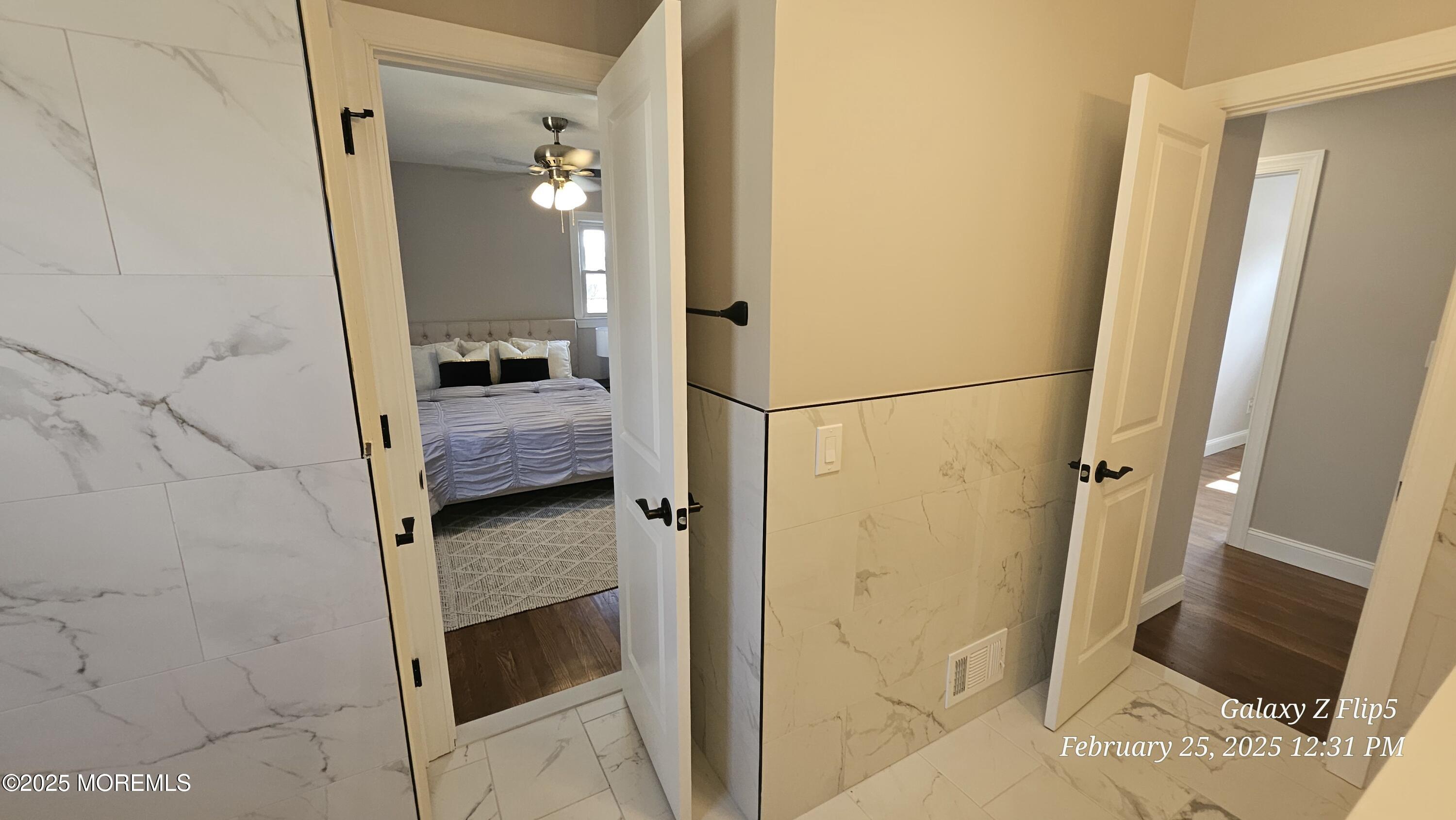 Park Avenue Freehold, NJ 07728 - Photo 8 of 18 a en suite bathroom with a sink and mirror