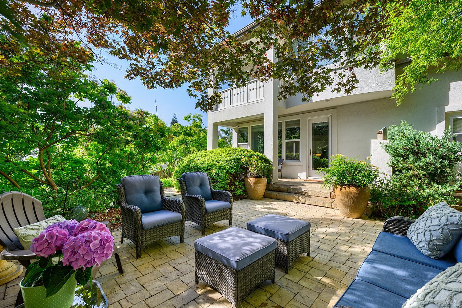 3696 Newbury Court Santa Rosa, CA 95404 - Photo 44 of 52 a view of a patio with couches table and chairs and potted plants