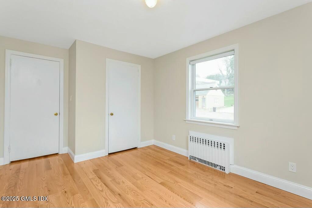 304 Valley Road Cos Cob, CT 06807 - Photo 13 of 21 a view of an empty room with a window