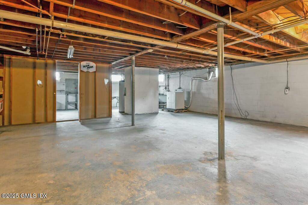 304 Valley Road Cos Cob, CT 06807 - Photo 17 of 21 a view of a room with wooden walls