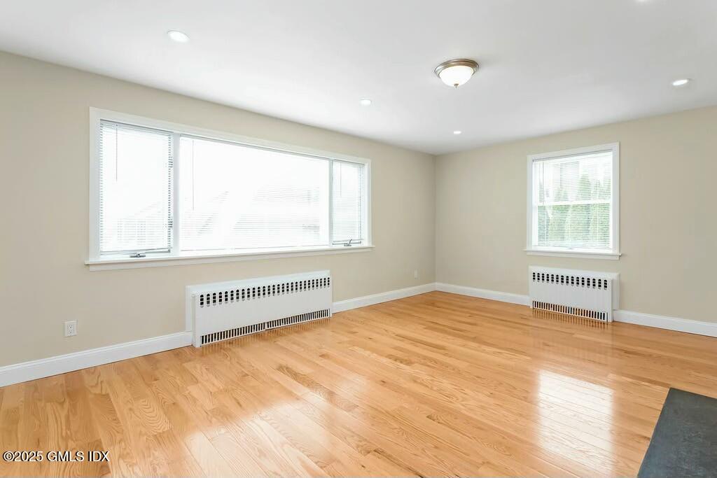 304 Valley Road Cos Cob, CT 06807 - Photo 3 of 21 a view of an empty room with a window