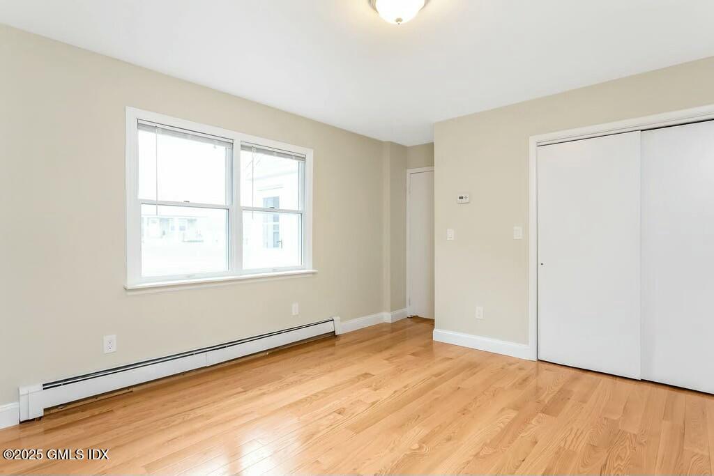 304 Valley Road Cos Cob, CT 06807 - Photo 9 of 21 a view of an empty room with a window