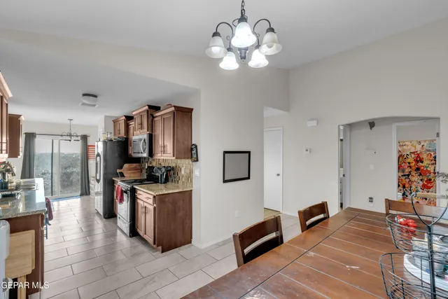 a view of kitchen center island and living room