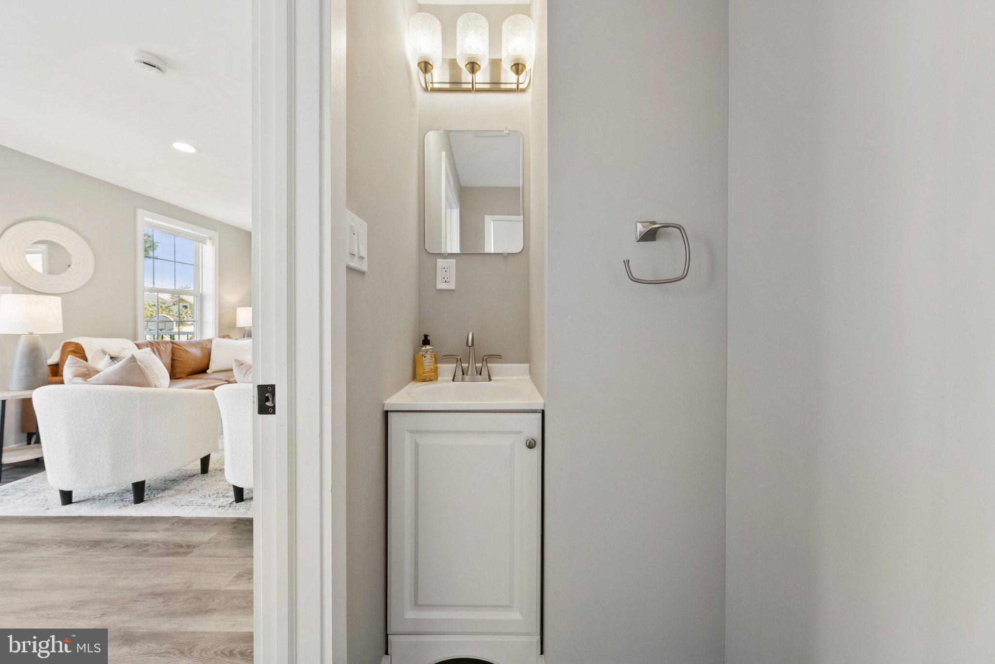 2116 R Street Northeast Washington, DC 20002 - Photo 21 of 42 Half bath on main level near living room