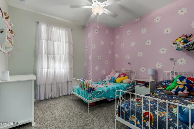 a dining room filled with furniture and toys
