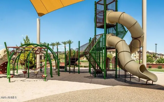 a building exterior with furniture