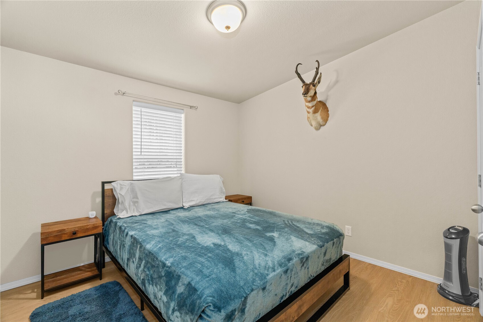 132 River Park Road Forks, WA 98331 - Photo 22 of 40 a bedroom with a bed and window