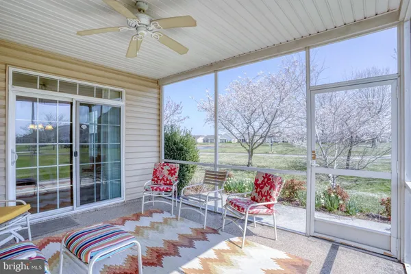 a house view with a outdoor seating space