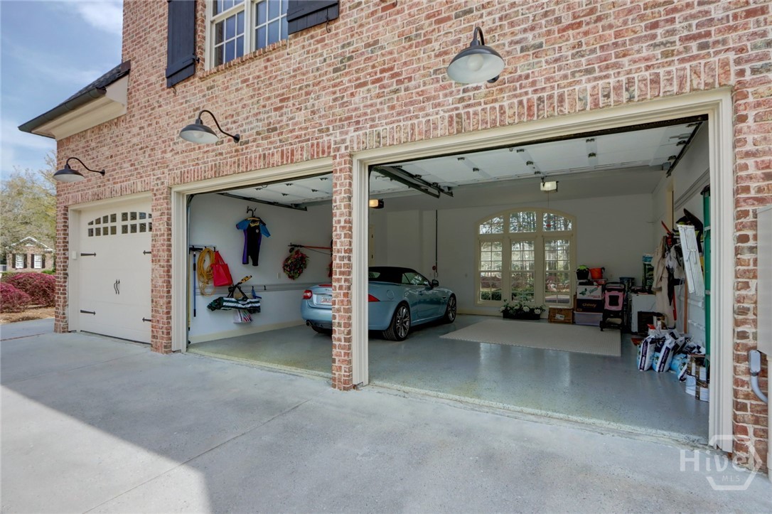 135 Puttenham Crossing Pooler, GA 31322 - Photo 59 of 65 3 Car garage or 2 Car / 1 Golf Cart garage.