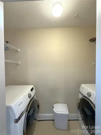 a bathroom with a toilet and a sink