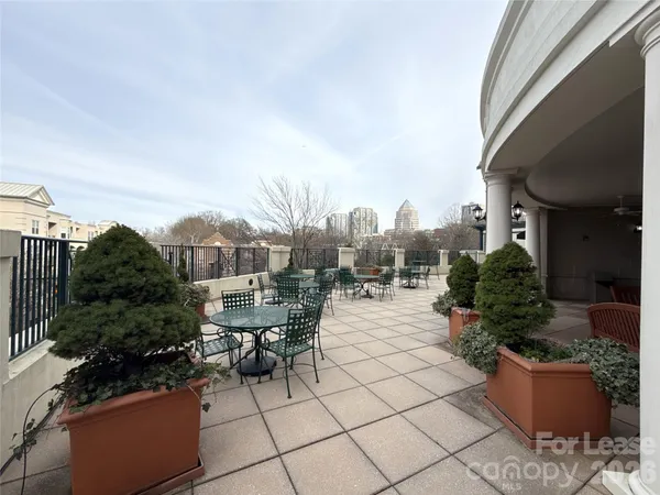 a view of a building with sitting area