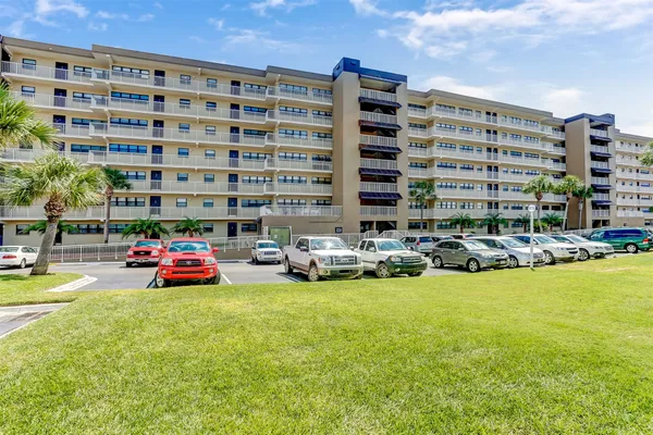 a cars parked in front of a building