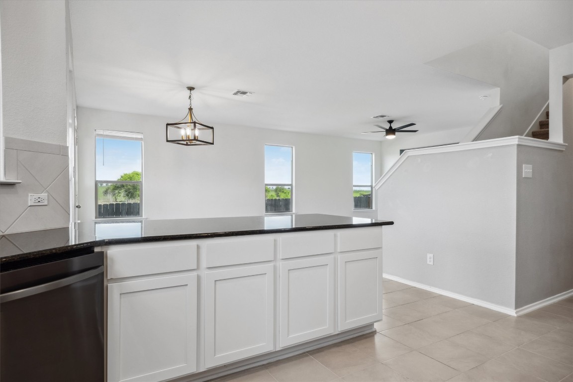 925 Yellow Ribbon Trail Jarrell, TX 76537 - Photo 11 of 35 a bathroom with a sink and a mirror
