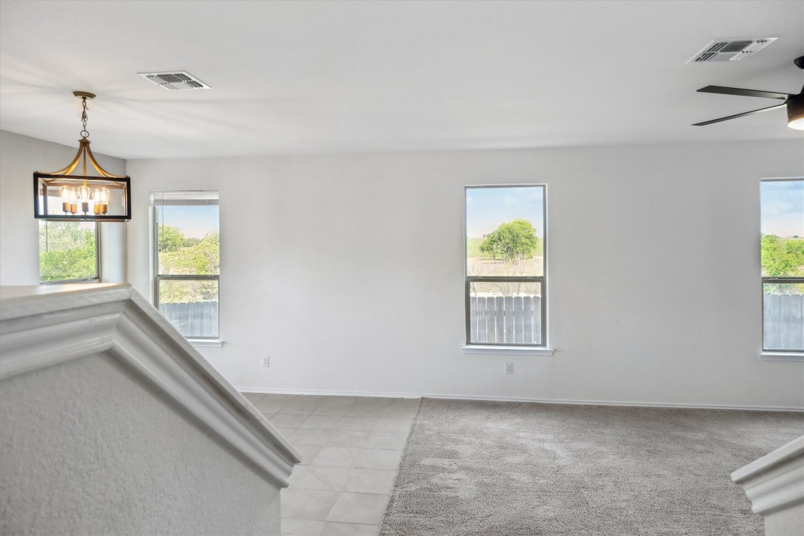 925 Yellow Ribbon Trail Jarrell, TX 76537 - Photo 15 of 35 a view of an empty room with a window