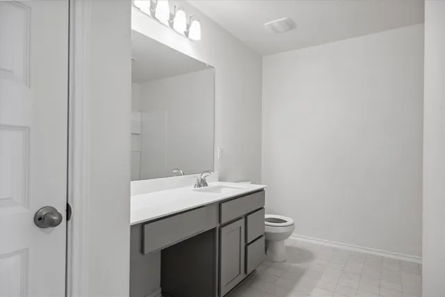 an empty room with closet area