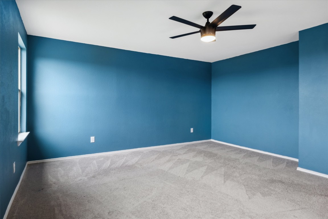 925 Yellow Ribbon Trail Jarrell, TX 76537 - Photo 23 of 35 a view of a room with a ceiling fan