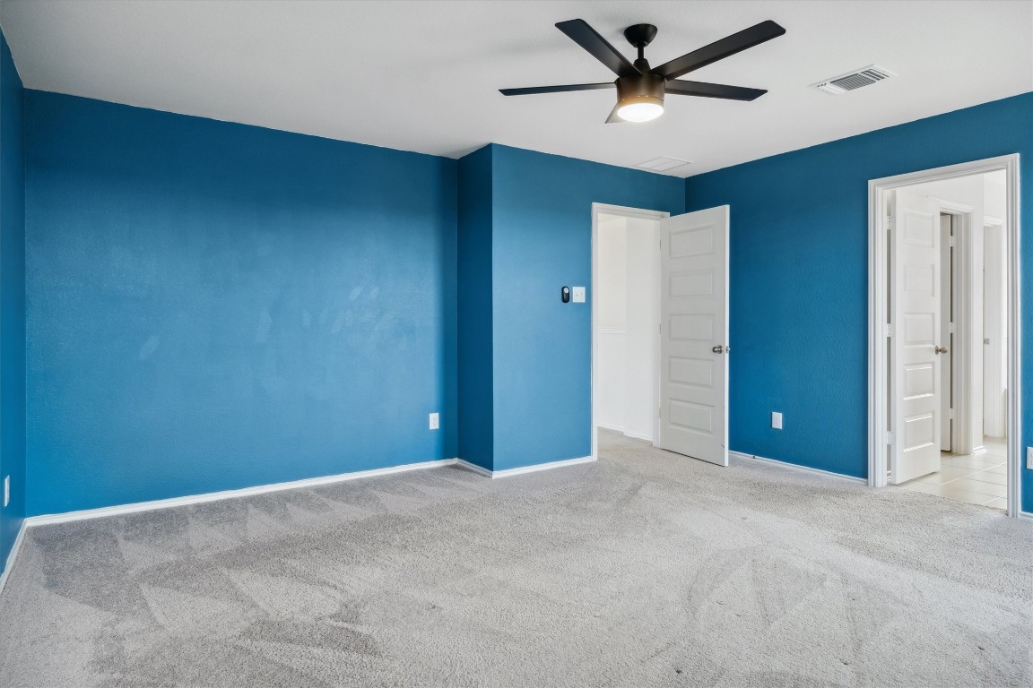 925 Yellow Ribbon Trail Jarrell, TX 76537 - Photo 24 of 35 a view of a livingroom with a ceiling fan