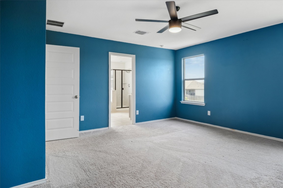 925 Yellow Ribbon Trail Jarrell, TX 76537 - Photo 25 of 35 a view of an empty room with a window