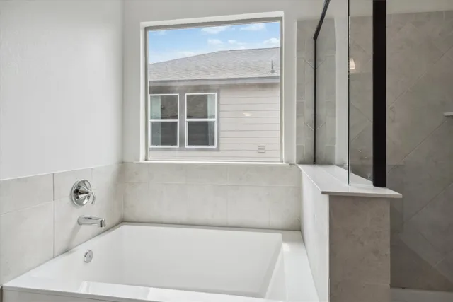 a bathroom with a double vanity sink mirror and toilet