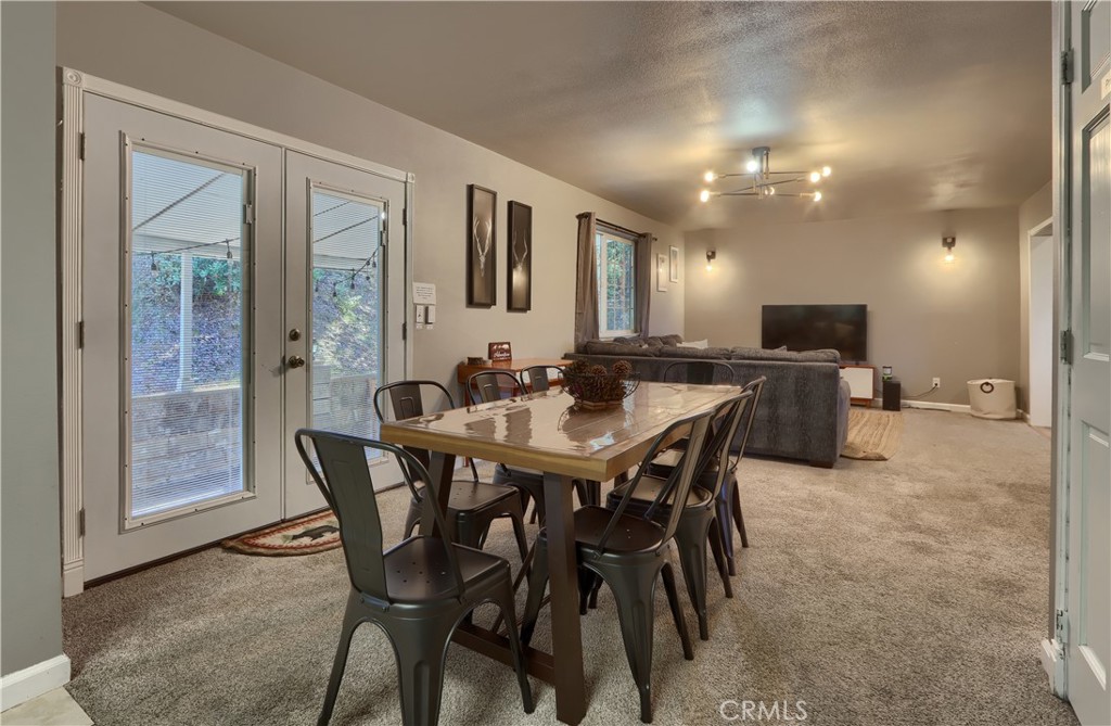 5197 Colorado Road Midpines, CA 95345 - Photo 16 of 47 a view of a dining room with furniture