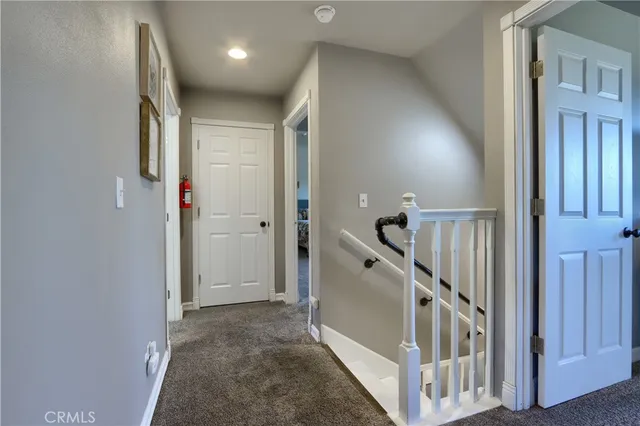 a view of hallway with stairs