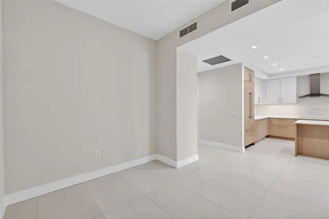 a bathroom with a shower sink vanity mirror and toilet