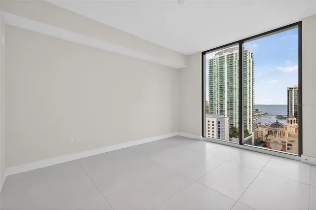 a room with a sink and cabinets