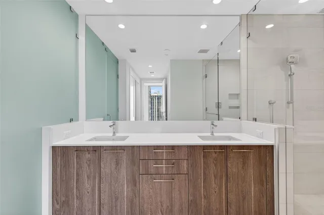 a view of storage and utility room with washer and dryer