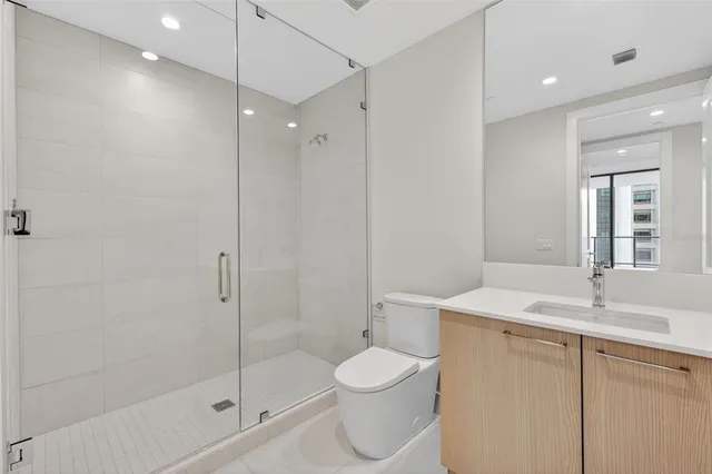 a swimming pool with outdoor seating and yard