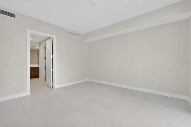 a view of a swimming pool with outdoor seating