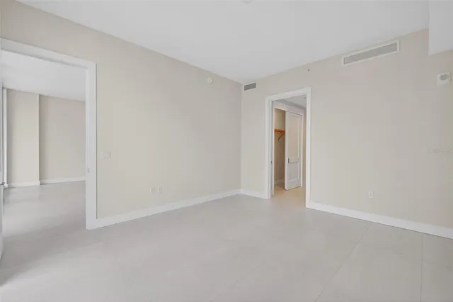 a kitchen with a table and chairs in it