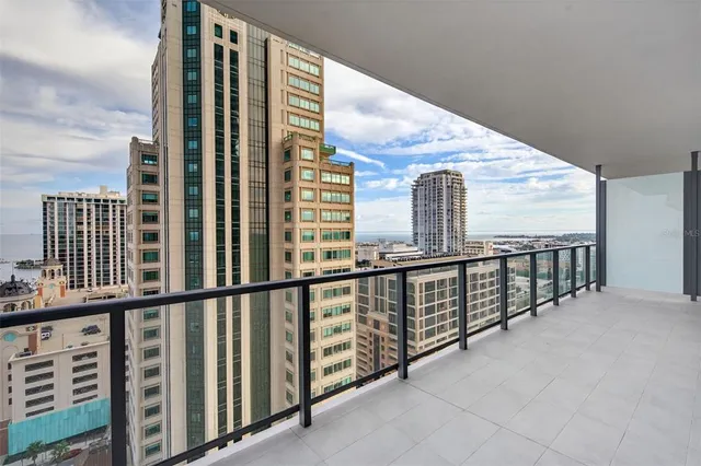 a view of a city with tall buildings