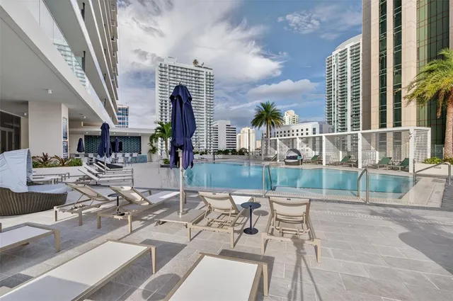 a view of balcony with furniture