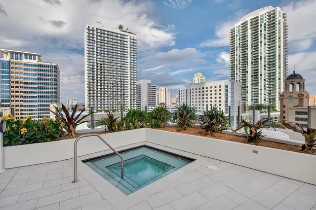 a view of a building with sitting area