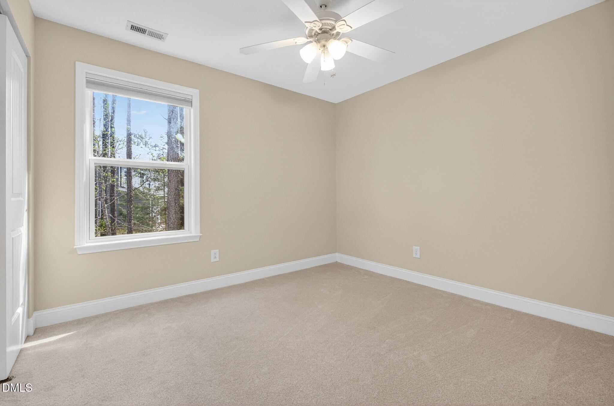1304 Barnford Mill Road Wake Forest, NC 27587 - Photo 33 of 44 an empty room with a window