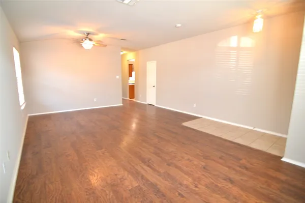 a view of a livingroom with wooden floor