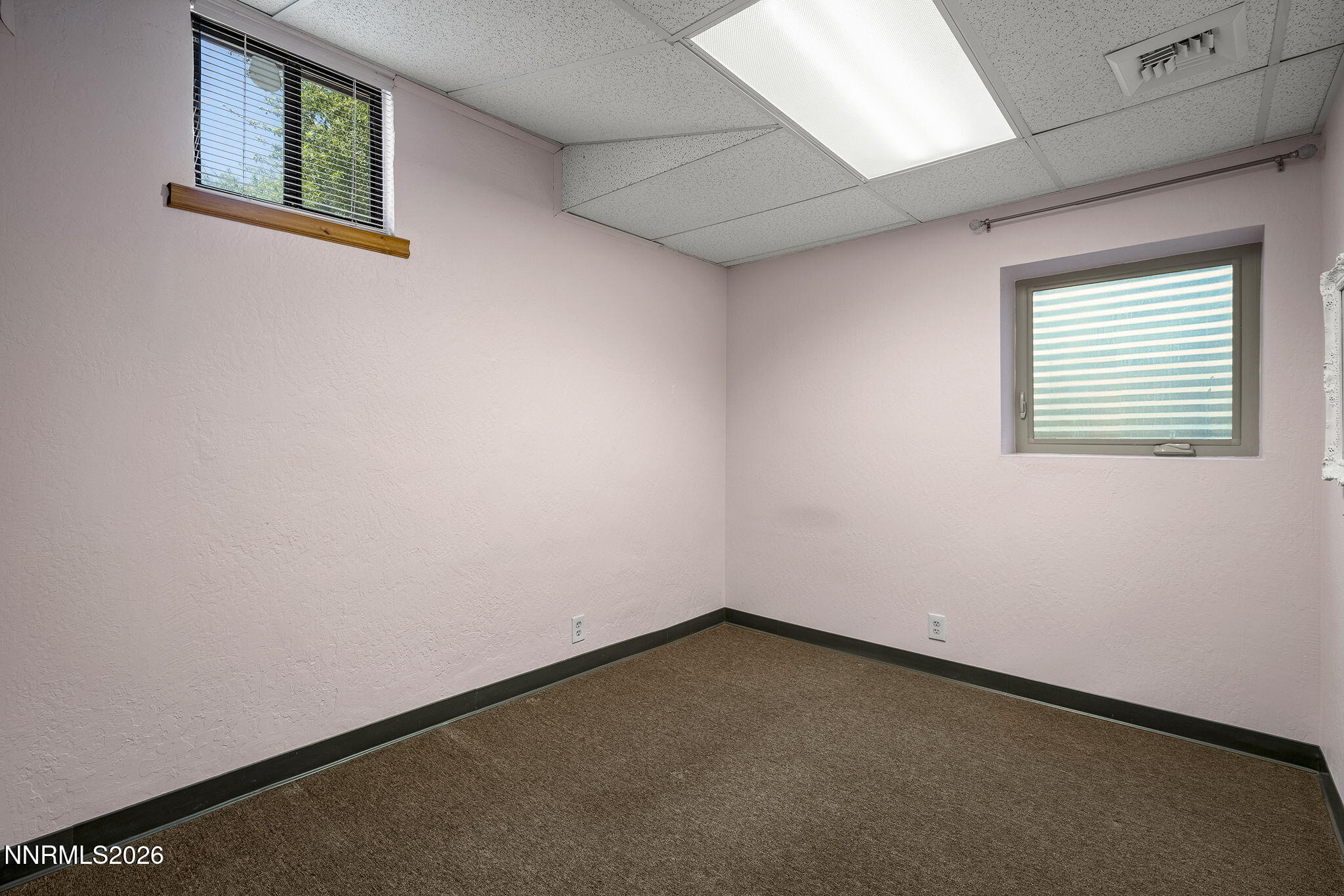 2985 Socrates Drive Reno, NV 89512 - Photo 33 of 52 an empty room with a window