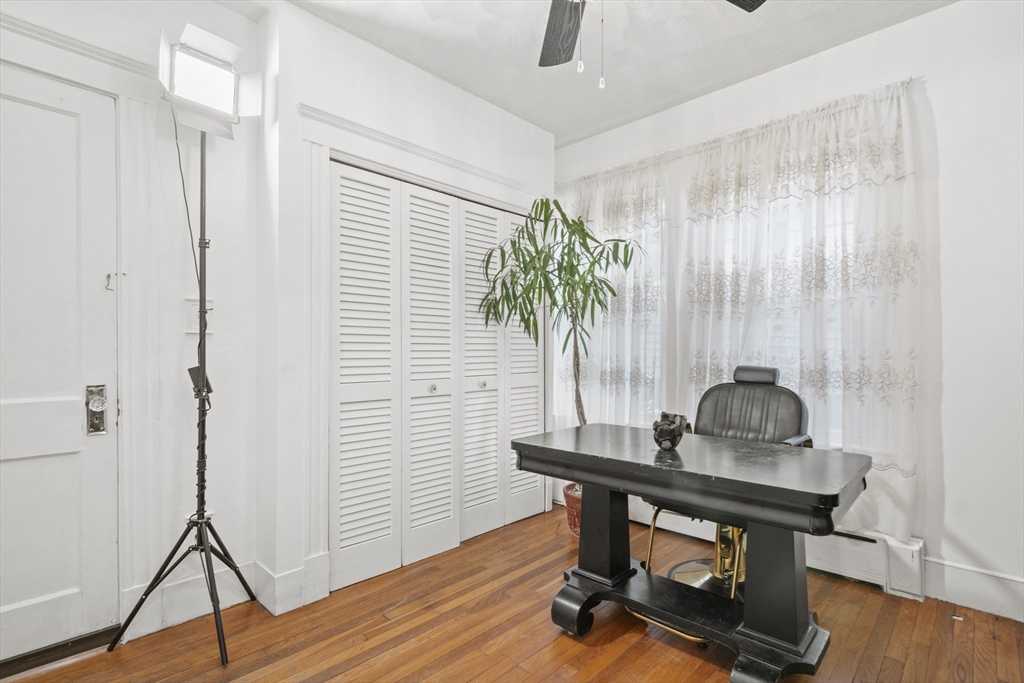 31 Madison Street Lynn, MA 01902 - Photo 13 of 30 a workspace with furniture and wooden floor