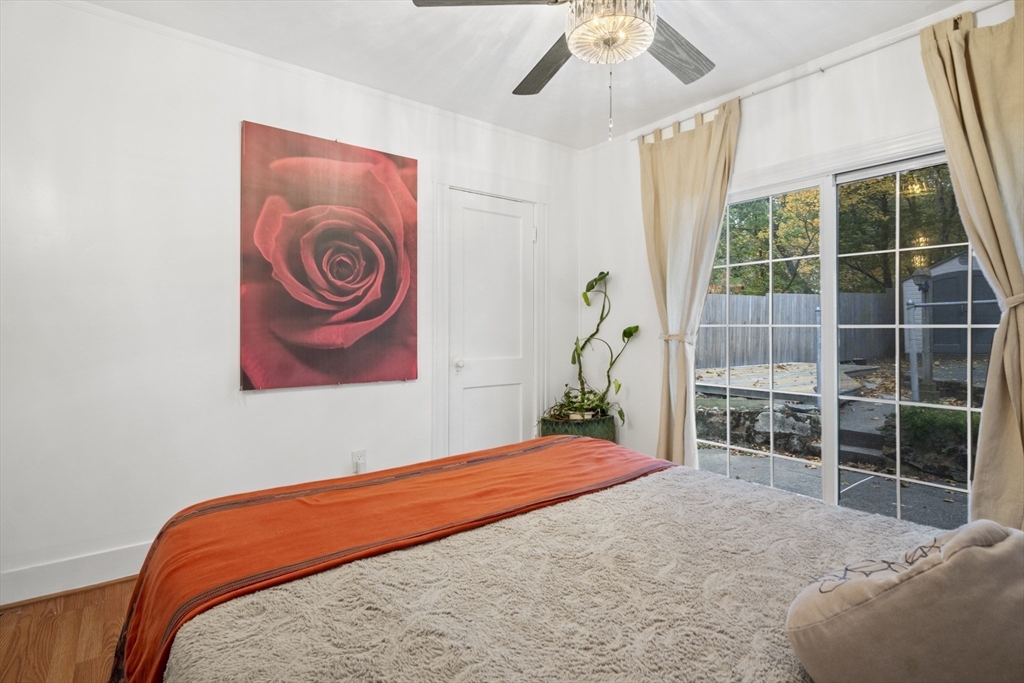 31 Madison Street Lynn, MA 01902 - Photo 17 of 30 a bedroom with a bed and a window