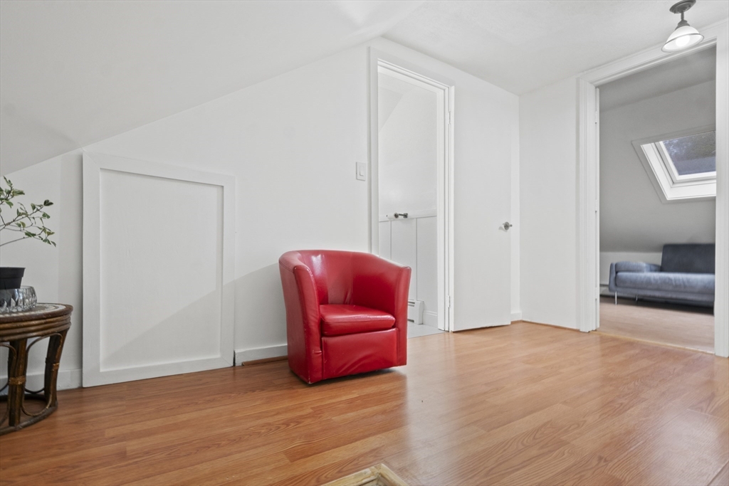 31 Madison Street Lynn, MA 01902 - Photo 26 of 30 a room with a chair and mirror