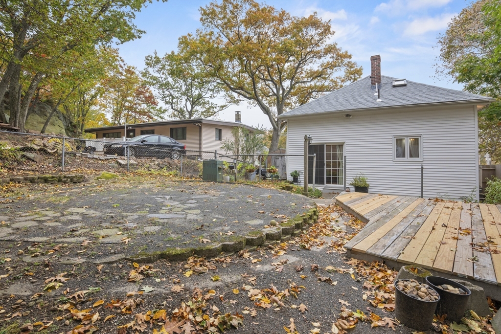 31 Madison Street Lynn, MA 01902 - Photo 29 of 30 a front view of a house with a yard