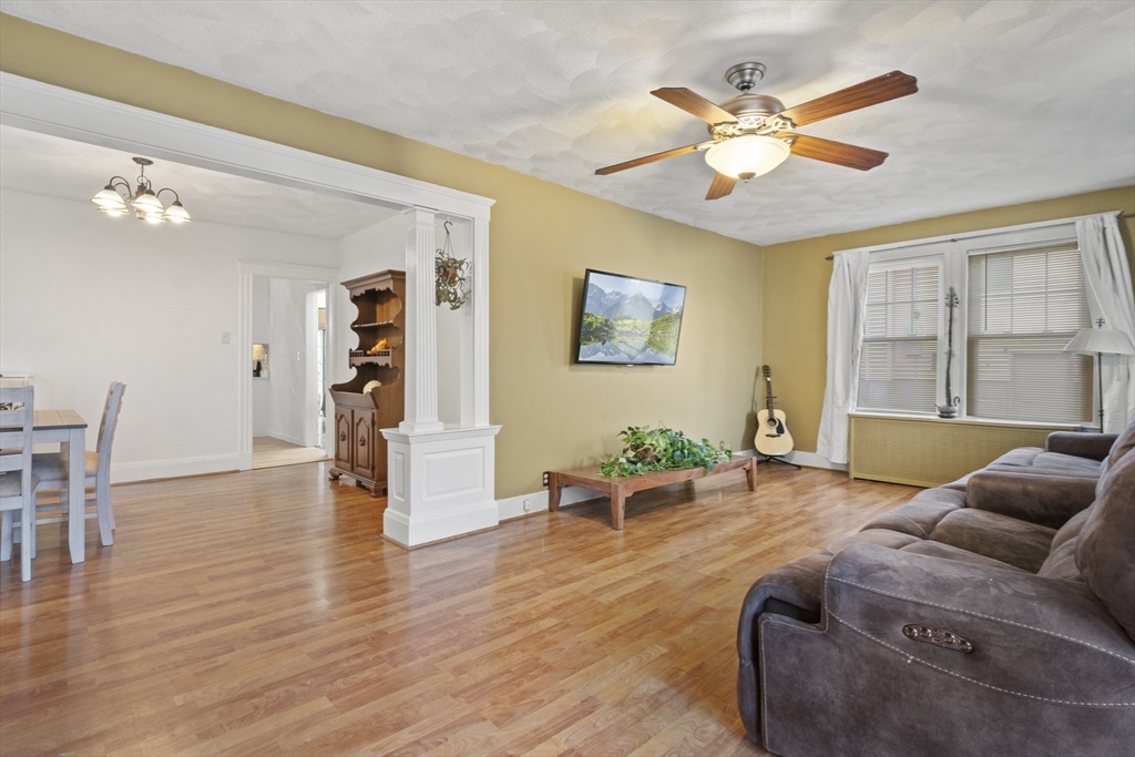 31 Madison Street Lynn, MA 01902 - Photo 3 of 30 a living room with furniture and wooden floor