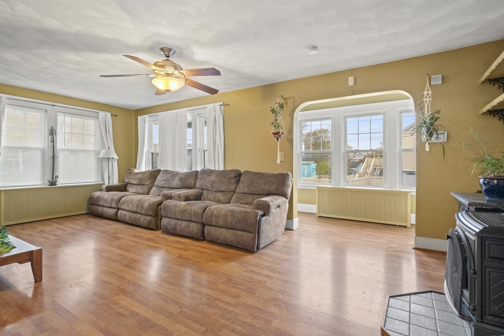 31 Madison Street Lynn, MA 01902 - Photo 5 of 30 a living room with furniture and a large window
