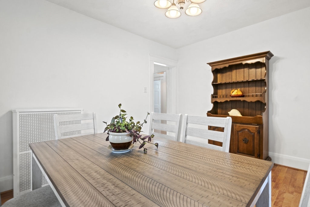 31 Madison Street Lynn, MA 01902 - Photo 7 of 30 a room with a table chair and a dining table