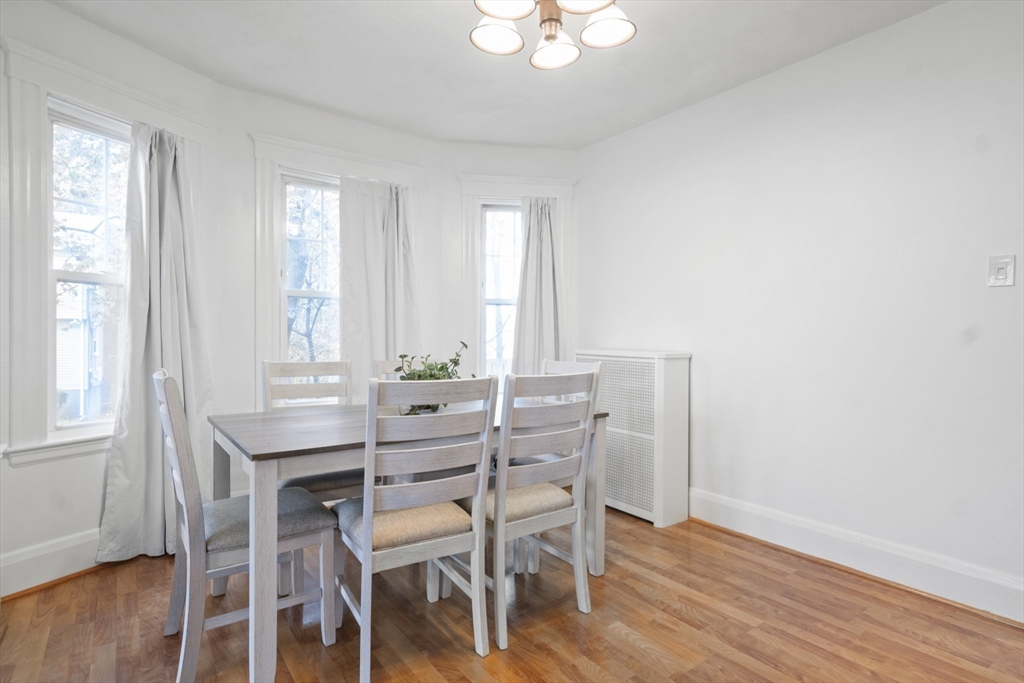 31 Madison Street Lynn, MA 01902 - Photo 8 of 30 a view of a dining room with furniture and wooden floor