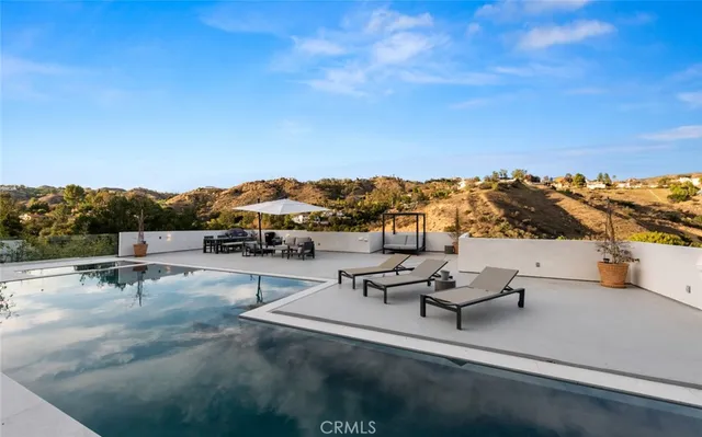 a view of a terrace with chairs