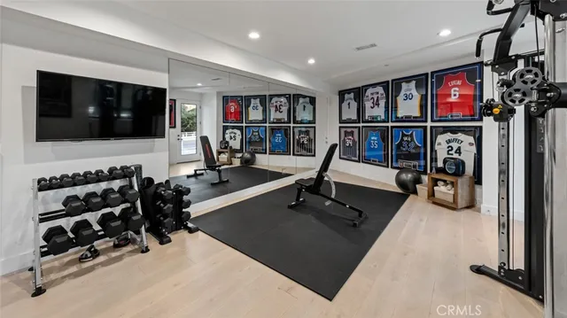 a view of a field with a big house