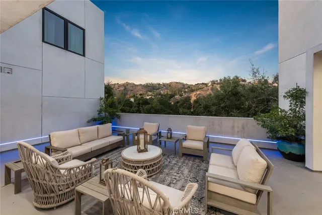 a view of patio with furniture