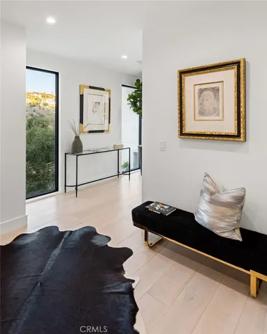 a view of swimming pool with outdoor seating