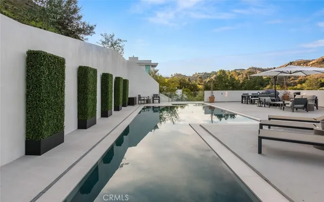 a view of gym equipment and shelves